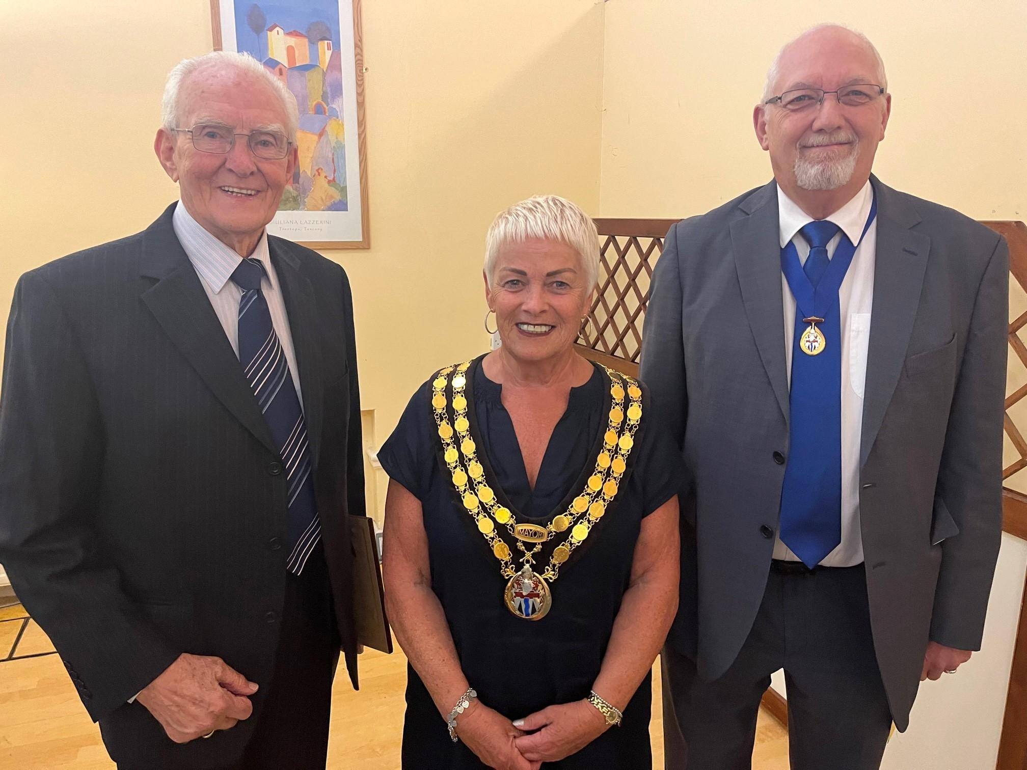 Mayor Sue Bell stands between Allan Sullivan and Owen Baldock