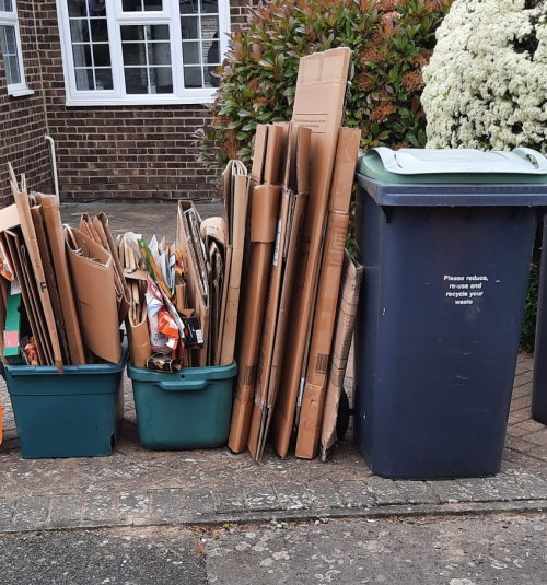 Carboard waste collection, with additional folded cardboard