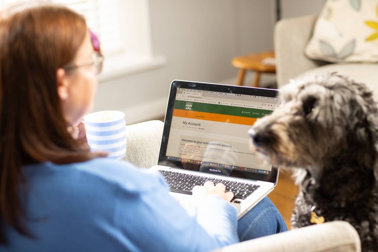 Woman accessing council services on a laptop