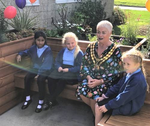 Mayor Sue Bell with local primary school pupils on the Friendly Bench