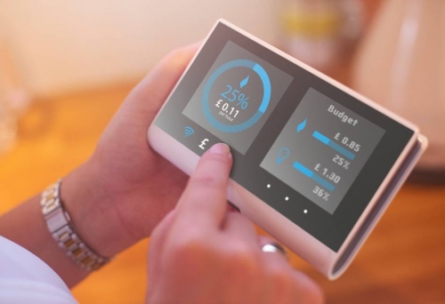 Hand holding a smart meter