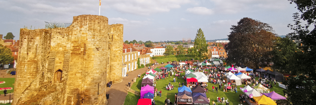 Aerial shot of an event in the grounds of Tonbridge Castle