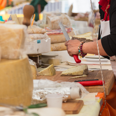 A stall with cheeses from around the world